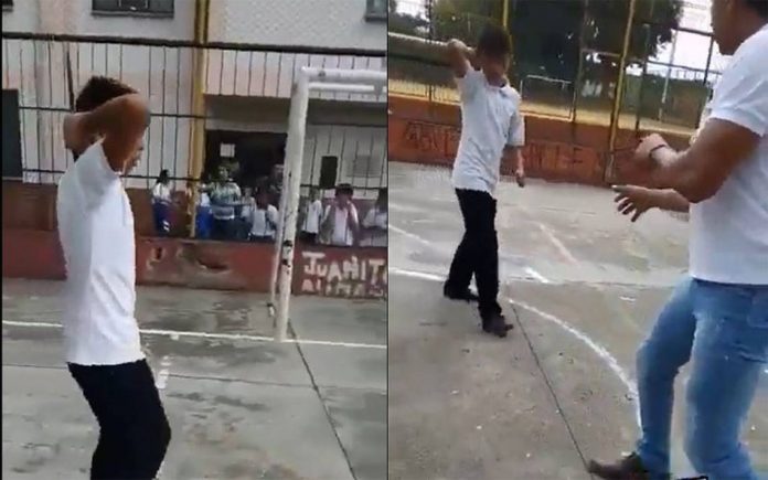 Niño amenaza a profesor